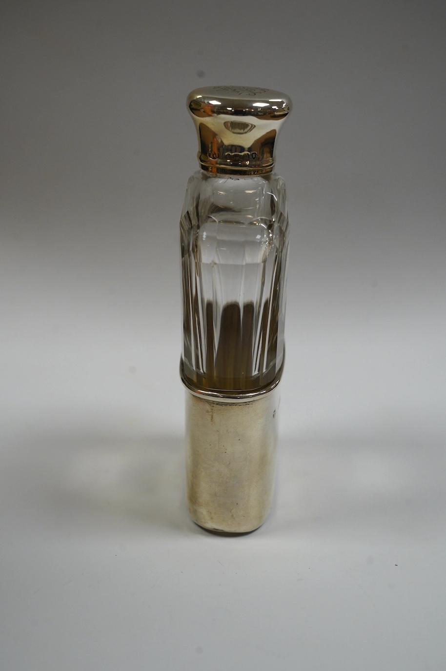 A Victorian silver mounted cut glass spirit flask, with engraved monograms, by Thomas Johnson II, London, 1876, 12cm. Condition - fair to good